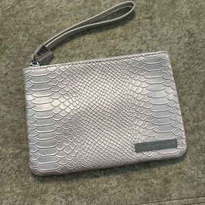 NWOT Rodan + Fields faux silver snakeskin wristlet